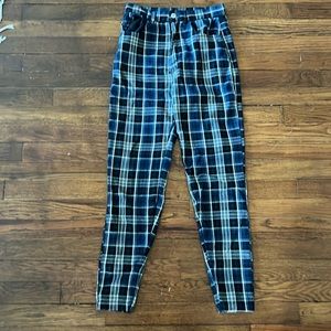Blue black and white plaid pants, tight fitting, stops at ankles cotton